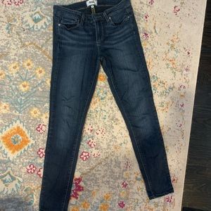 Paige dark-wash skinny jeans.
